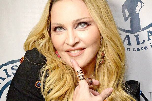Madonna cozies up to dancer Ahlamalik Williams